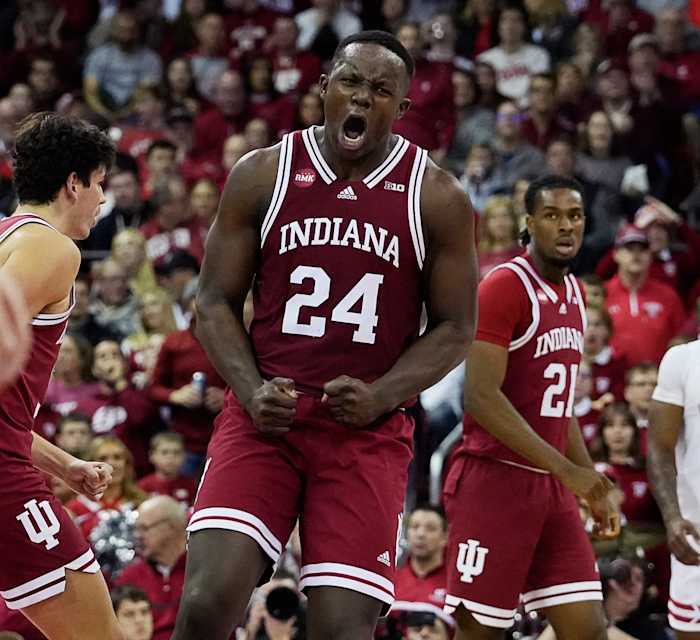 Indiana Hoosiers forward Payton Sparks (24) celebrates his dunk against the Wisconsin Badgers.